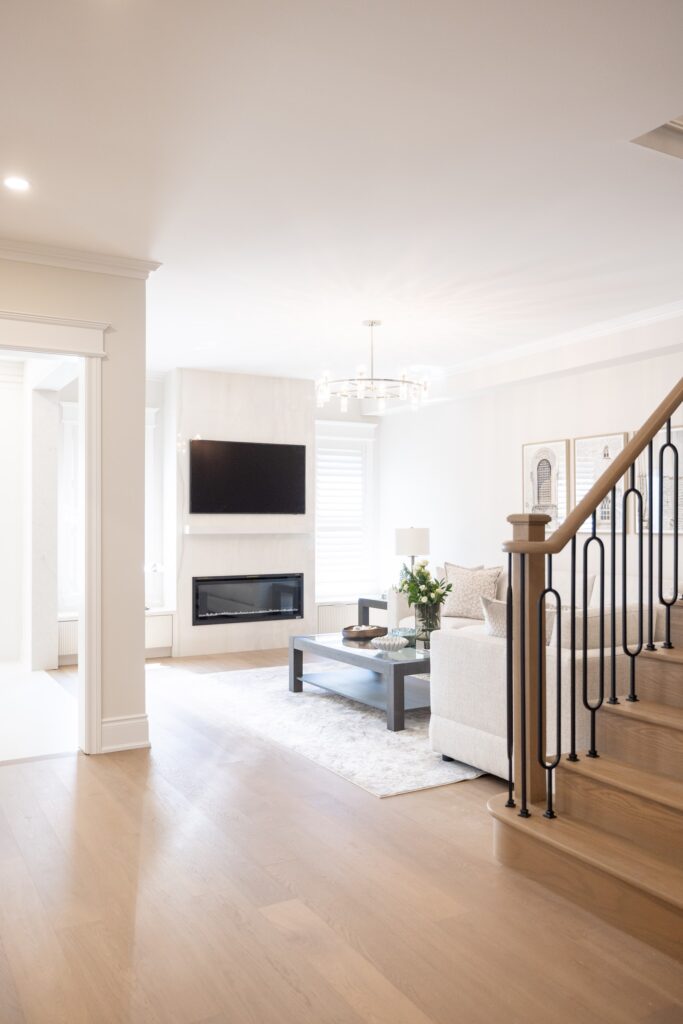 Living room with fireplace after a full home renovation
